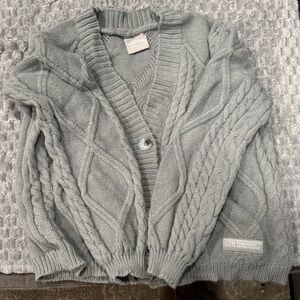 Taylor Swift The Tortured Poets Department gray cardigan.
